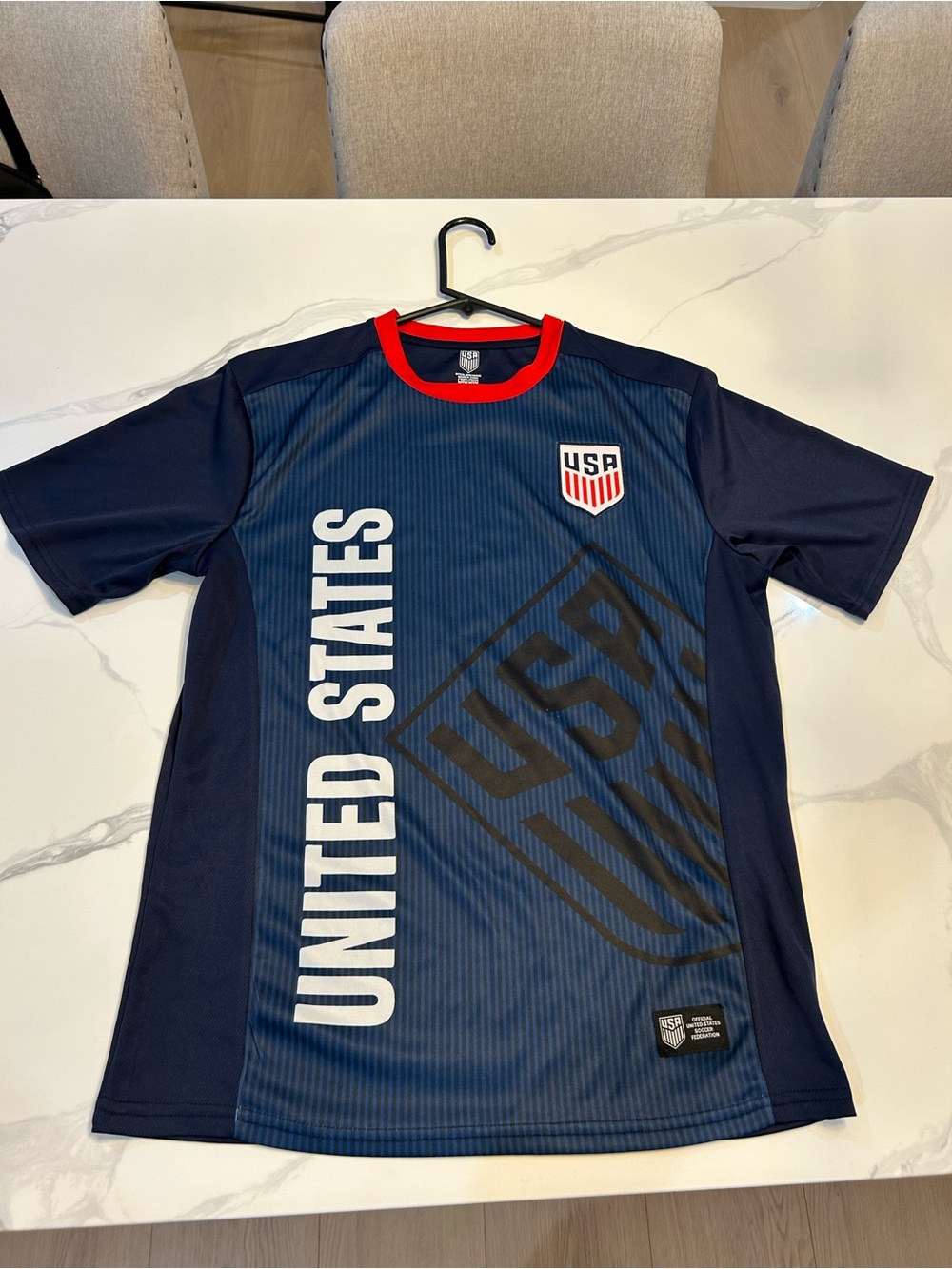 2023 USA Soccer Federation Tee - Navy with Red Trim. Size Medium